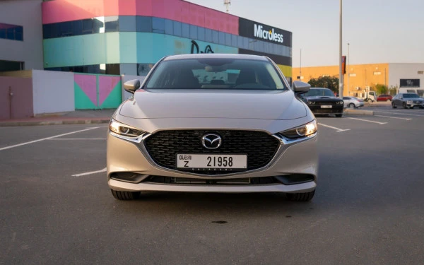Gold Mazda 3, 2024 Photo 1