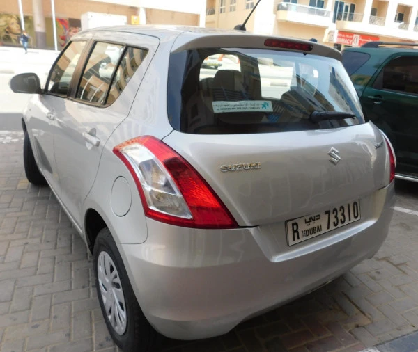 Silver Suzuki Swift, 2016 Photo 2
